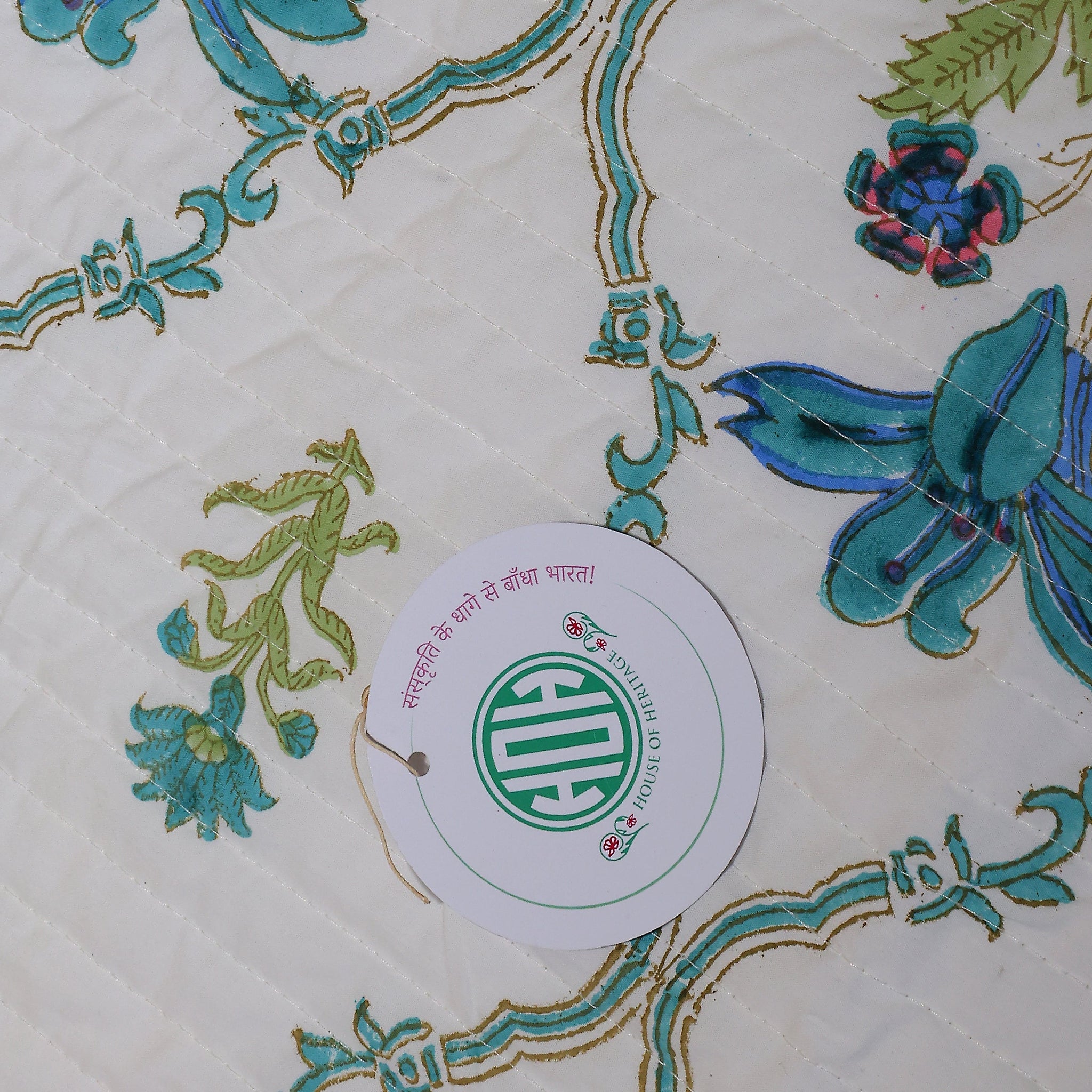 Handcrafted Block Printed Blooming Flower Print Quilted Bedcover With Two Pillowcases